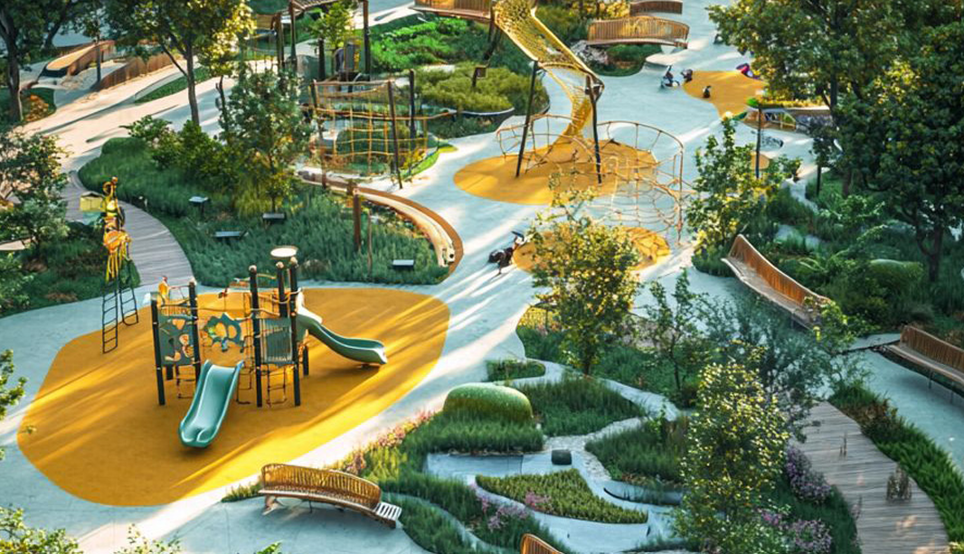 Aerial view of a nature-inspired children's playground with slides, climbing structures, and landscaped greenery